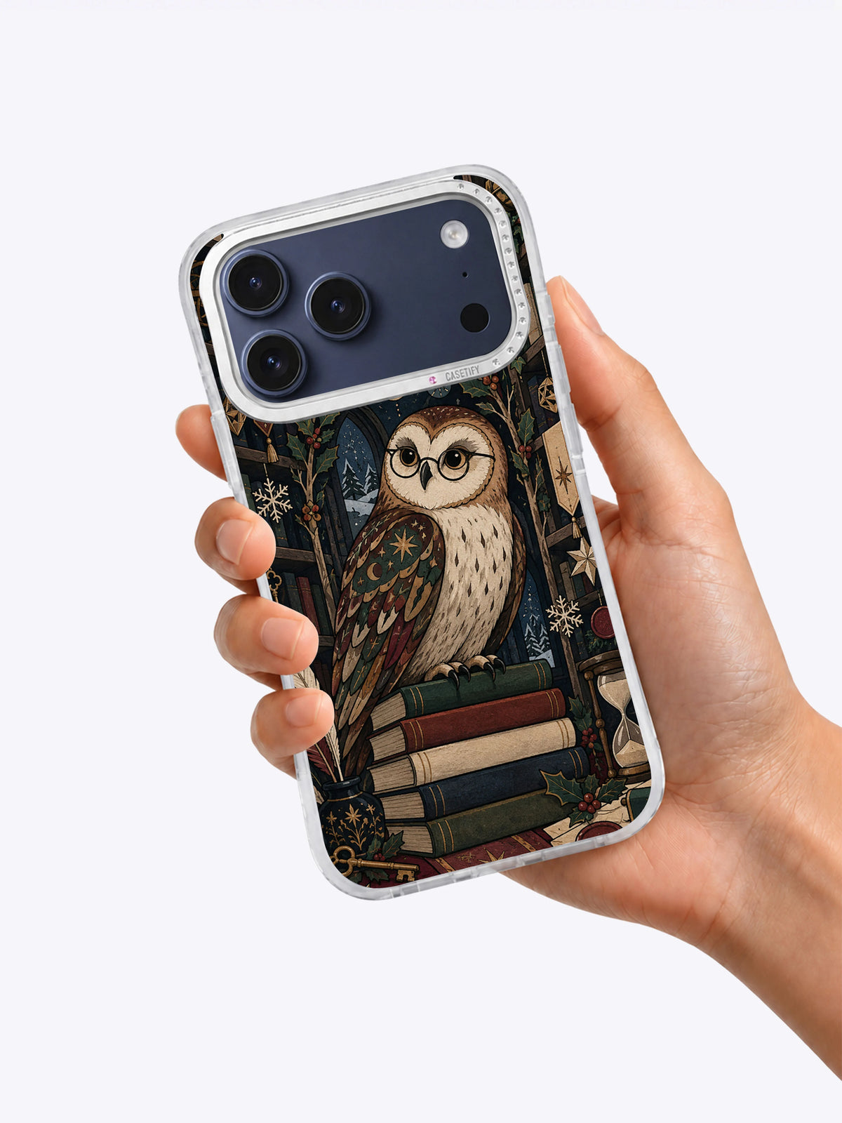 Holly Library Owl iPhone 17 Pro Max case held in hand