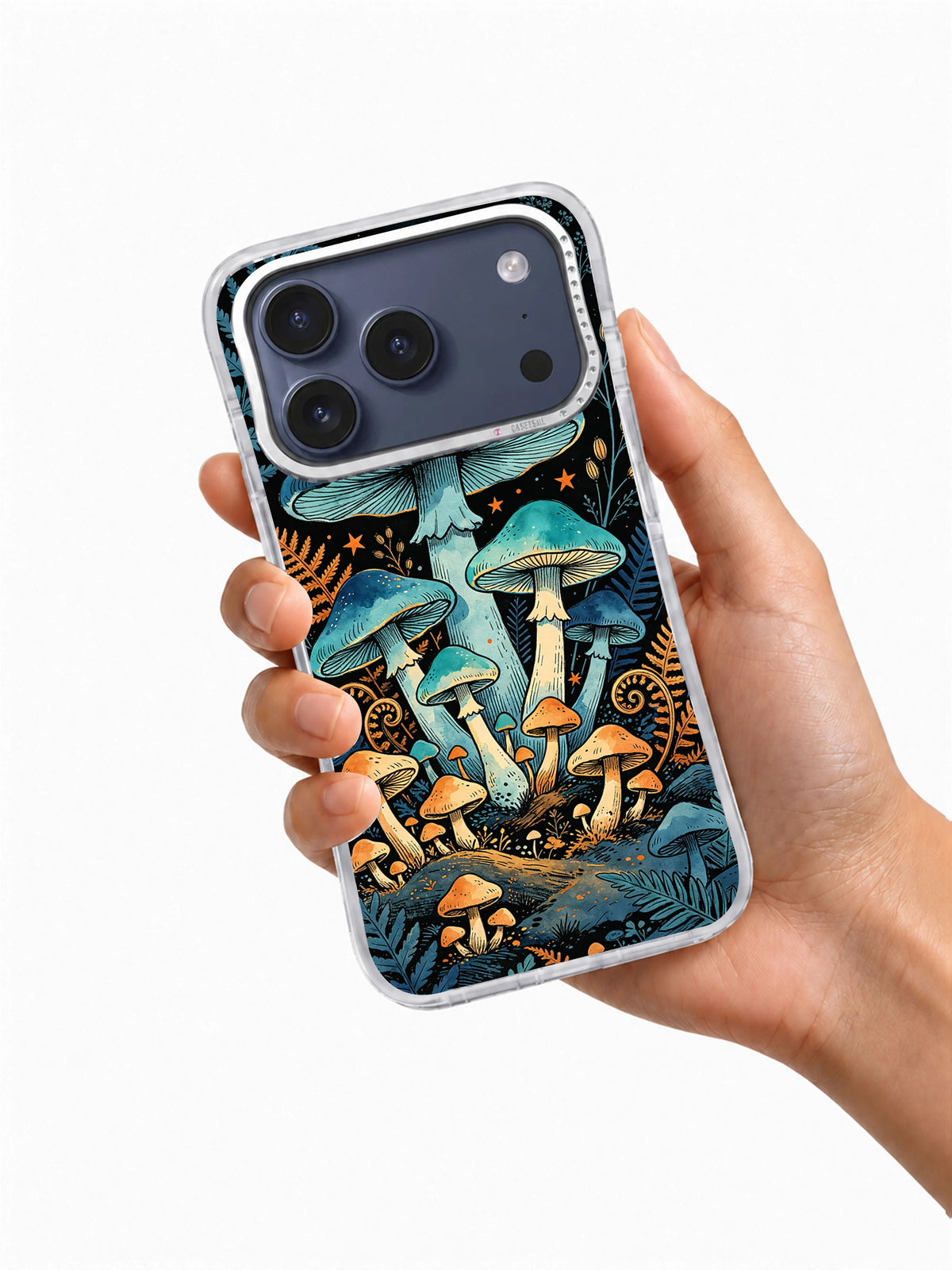 Hand holding a clear iPhone case printed with Indigo Mushroom Observatory art