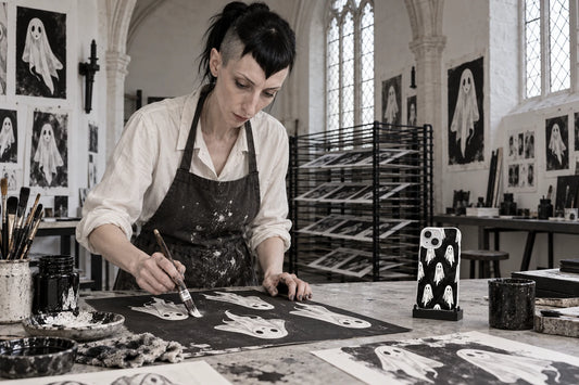 AI visualization of Vesper Wraith illustration studio with an iPhone 15 Plus art case on a stand