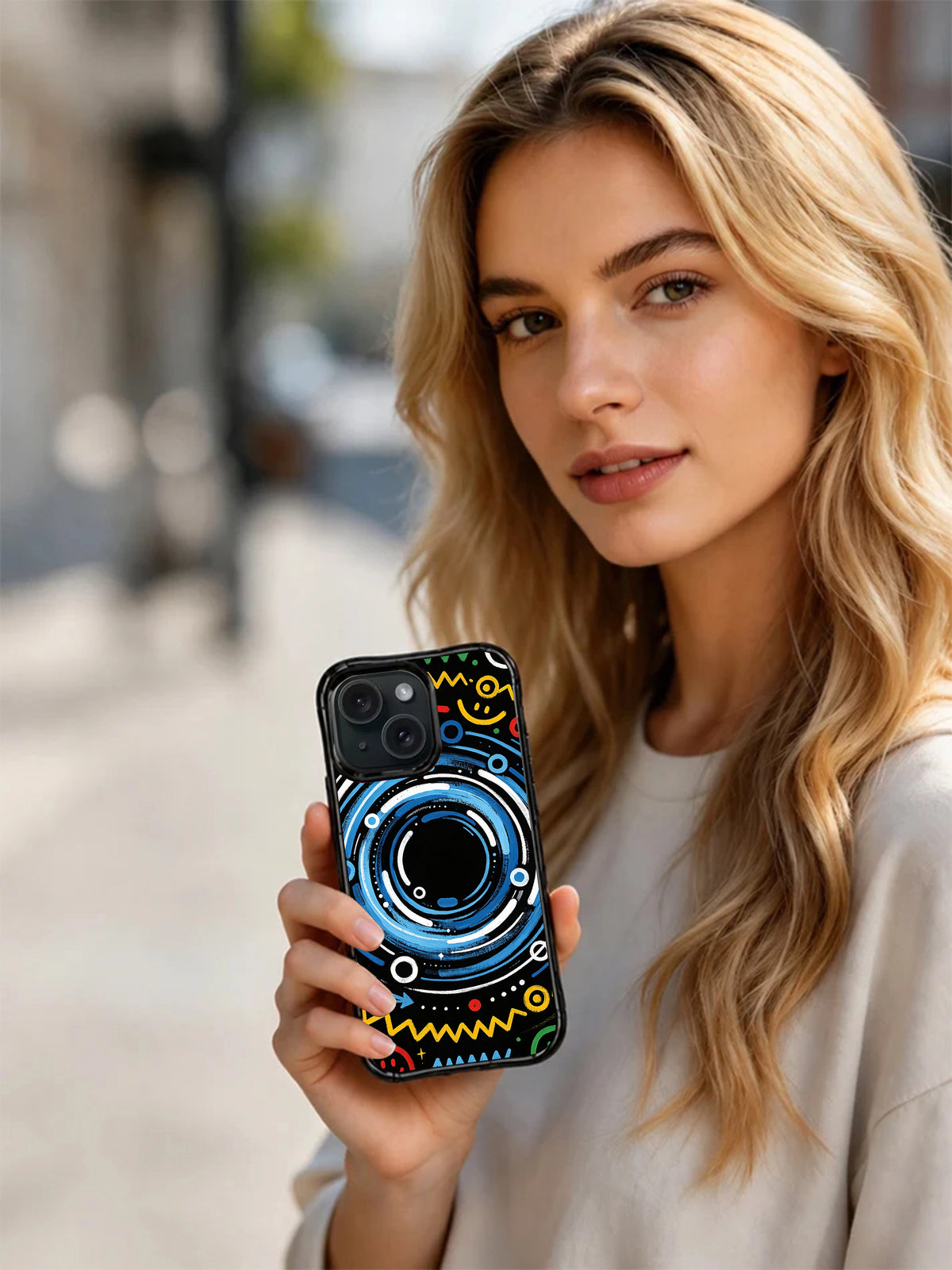 Joy Frequency artist-designed iPhone 15 Pro case lifestyle image
