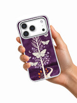 Hand holding the Lavender Solstice Moths iPhone 17 Pro case