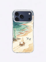 Silver Beach Bird Couriers artwork on an iPhone 17 Pro Max case with two seabirds guiding a small cart across sand