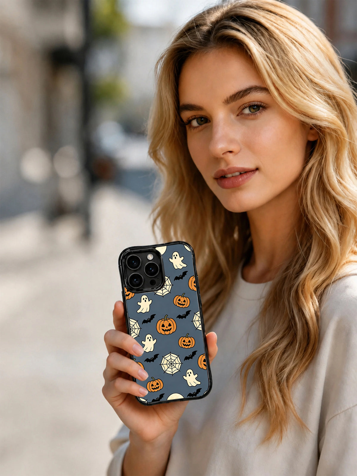 Moonlit spiderweb garden iPhone 14 Pro case lifestyle image