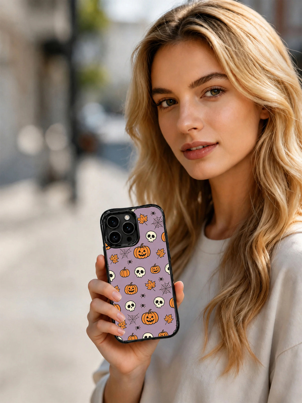 Skull pumpkin prelude iPhone 14 Pro case lifestyle image