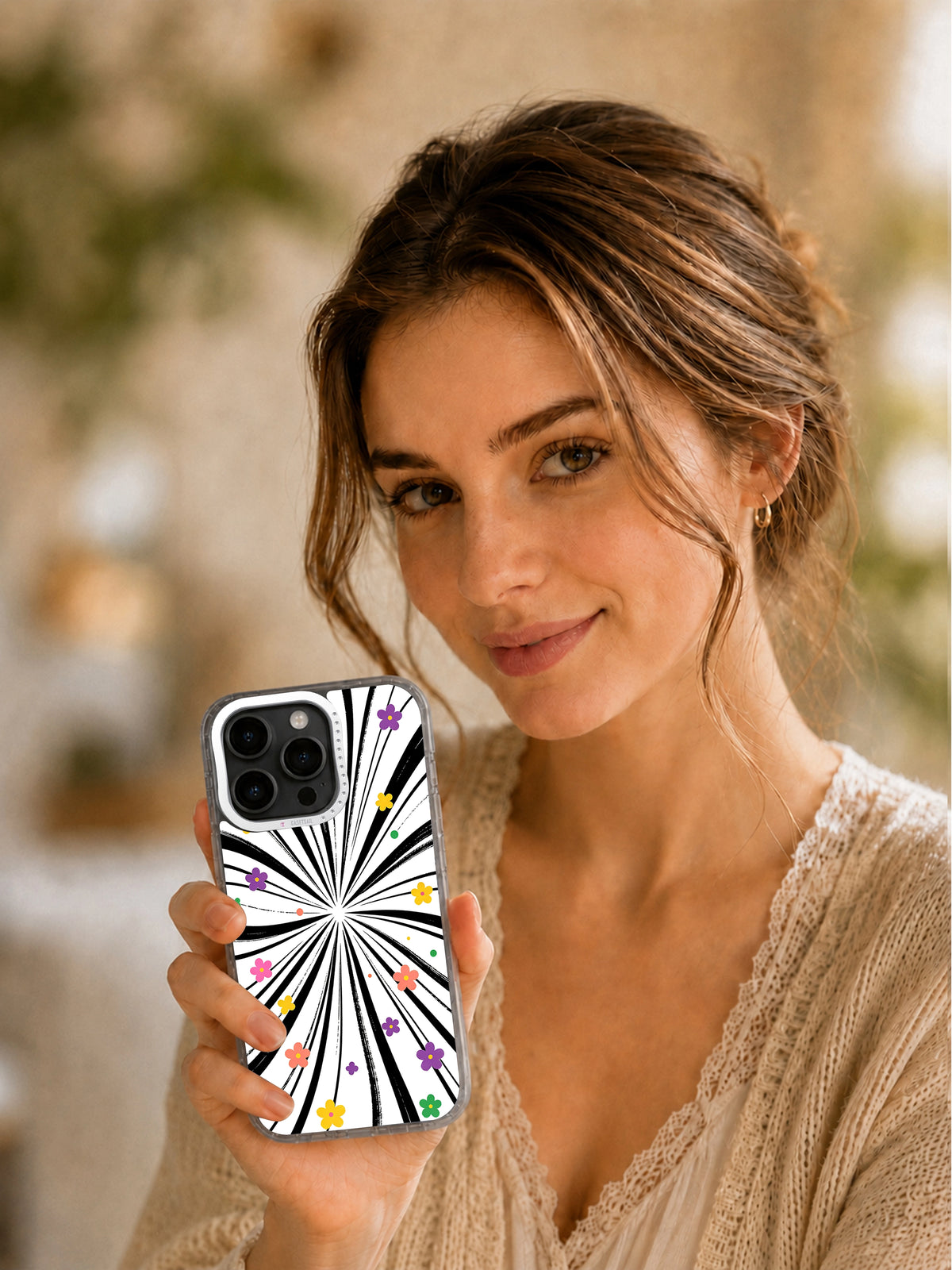 Woman holding Little Rainbow Universe art phone case