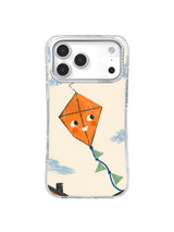 Orange kite with cobalt tail and broken flight path