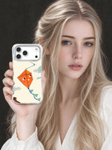Lifestyle view of the orange kite character phone case