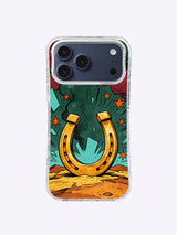 Gold horseshoe iPhone case artwork with a turquoise burst, dark green background, orange stars, and warm desert ground