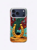 Lucky horseshoe comic iPhone case with forest-green smoke, burgundy field, turquoise shards, orange stars, and black impact marks