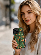 Model holding dark green squirrel acorn iPhone 14 Plus case