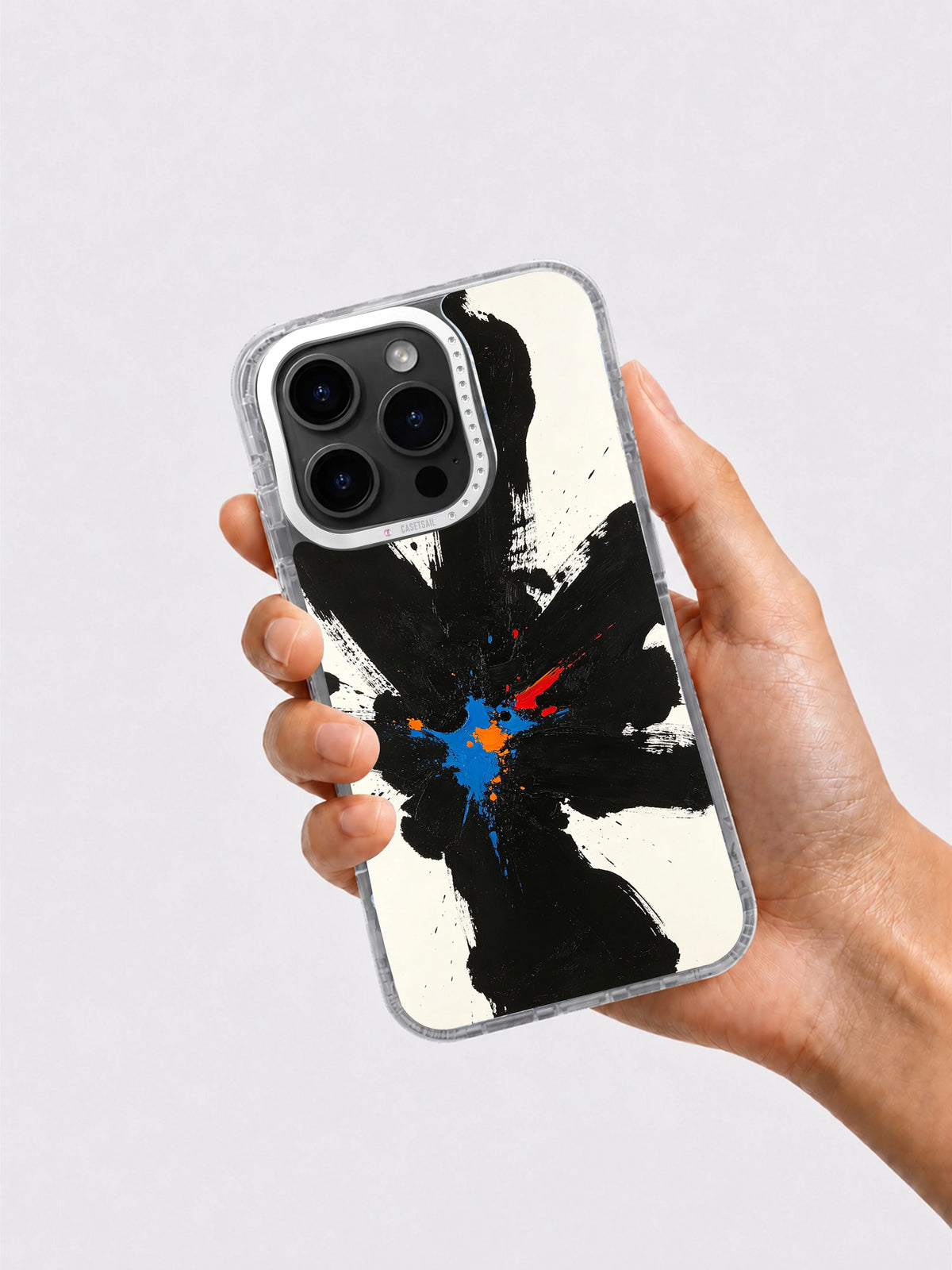 Abstract black art iPhone 16 Pro Max case held in hand