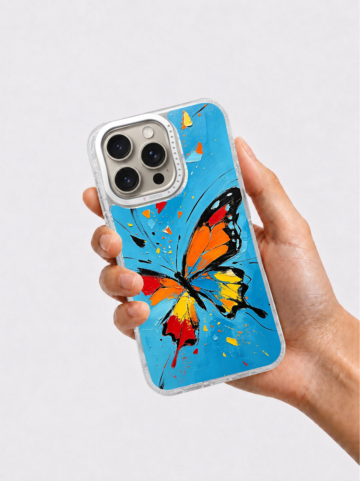 Abstract Butterfly Energy iPhone 16 Pro Max case in hand