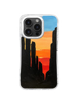 Black desert stone valley with orange sunset artwork for iPhone 16 Pro Max case