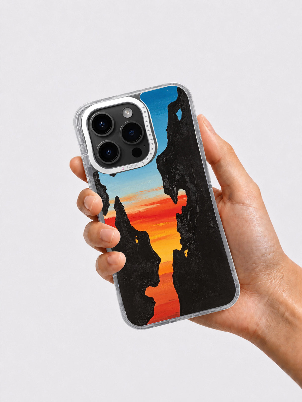 Wild Desert Rhythm iPhone 16 Pro Max case in hand