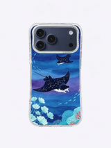 Manta rays crossing blue-violet reef water on an iPhone case
