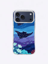 Silver fish curving around manta rays in deep blue water on an iPhone case