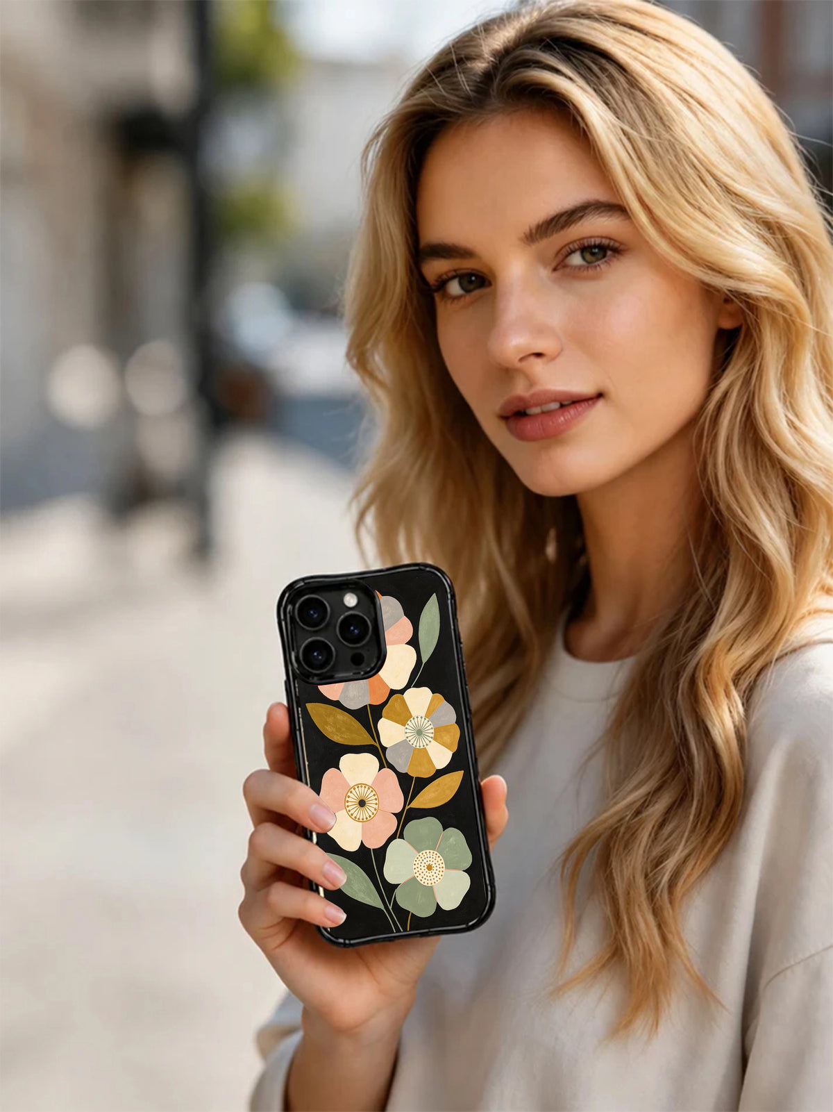 Mara Solen floral art iPhone 15 Pro case lifestyle image