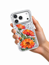 Marigold Carnival transparent iPhone 17 Pro case held in hand