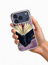 Hand holding the Midnight Book Burst open-book iPhone case