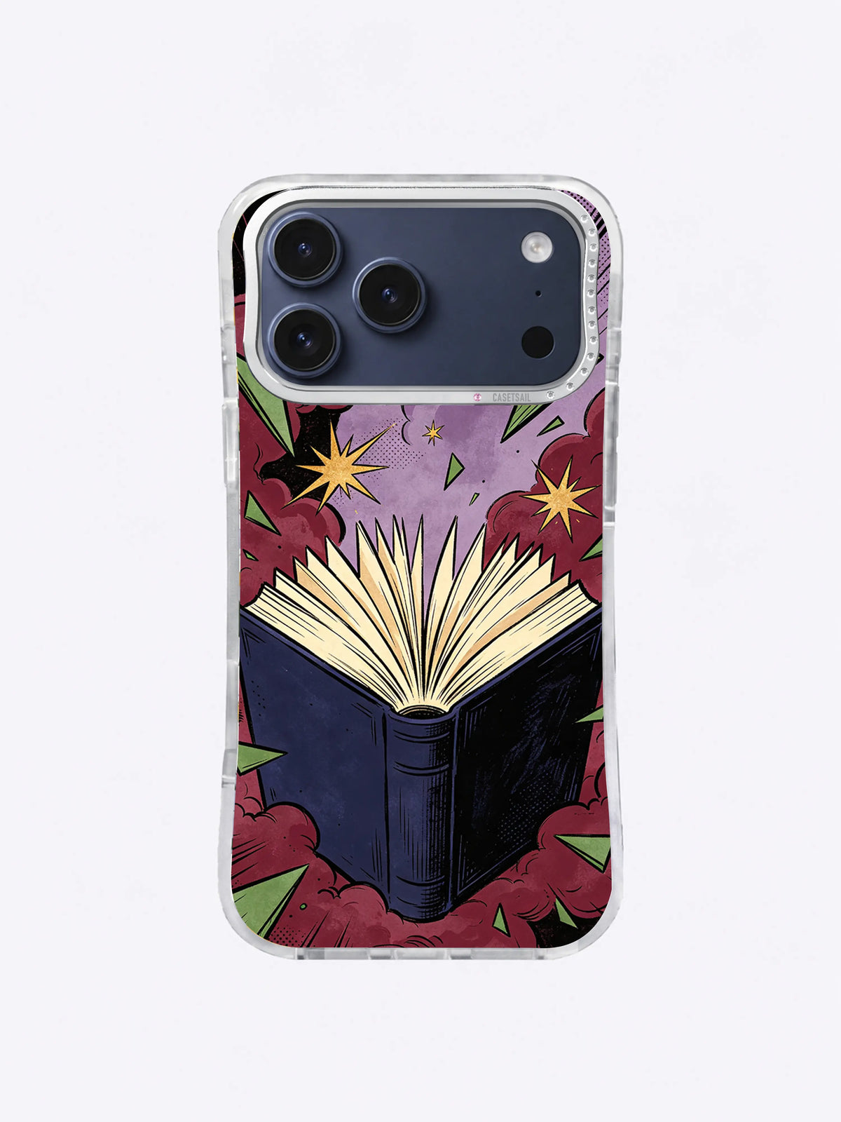 Vintage navy book iPhone case artwork with dramatically fanned pages, wine-red clouds, green shards, purple halftone, and antique-gold bursts