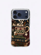 Cinnamon Star Cocoa iPhone case artwork with a patterned mug, cinnamon sticks, books, stars and winter botanicals