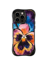 Giant Pansy Bloom: A single oversized purple, orange and pink pansy fills the case.