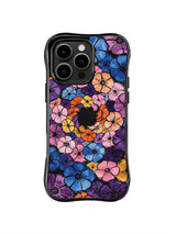 Violet Floral Wreath: Purple, pink, blue and orange flowers form a dense circular wreath.