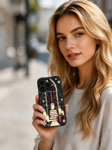 Lifestyle view of the Midnight Library Evergreen owl and books iPhone 15 Pro case