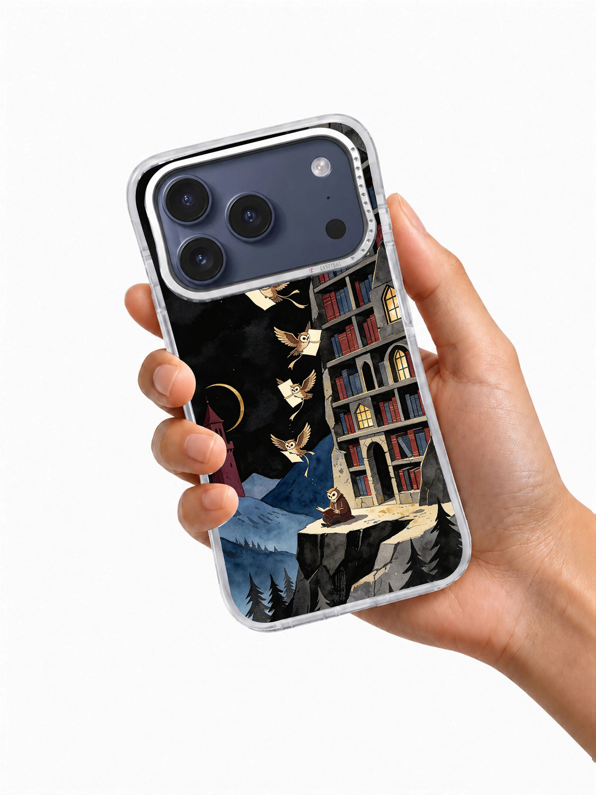 Hand holding a clear iPhone 17 Pro Max case printed with Midnight Library Wings owl library artwork