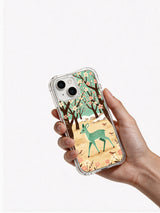 Mint Deer Blossom iPhone 13 case held in hand