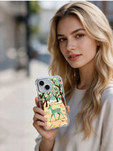 Mint Deer Blossom iPhone 13 case shown in a lifestyle portrait