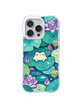Lotus Leaf Frog Listener: A small pale frog sits on a broad lotus leaf beneath purple blooms.