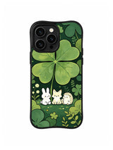 Giant Clover Friendship Trio: Small woodland friends rest beneath an oversized four-leaf clover.
