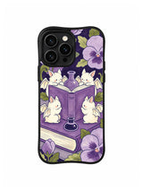 Violet Library Reading Circle: Four pale batlings gather around a large purple book among flowers and ink.