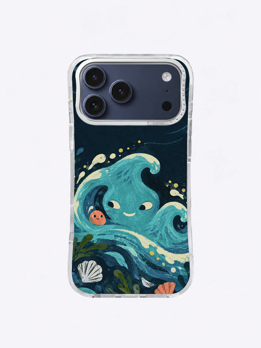 Turquoise wave creature with mismatched eyes beside a coral pebble on an iPhone 17 Pro Max case