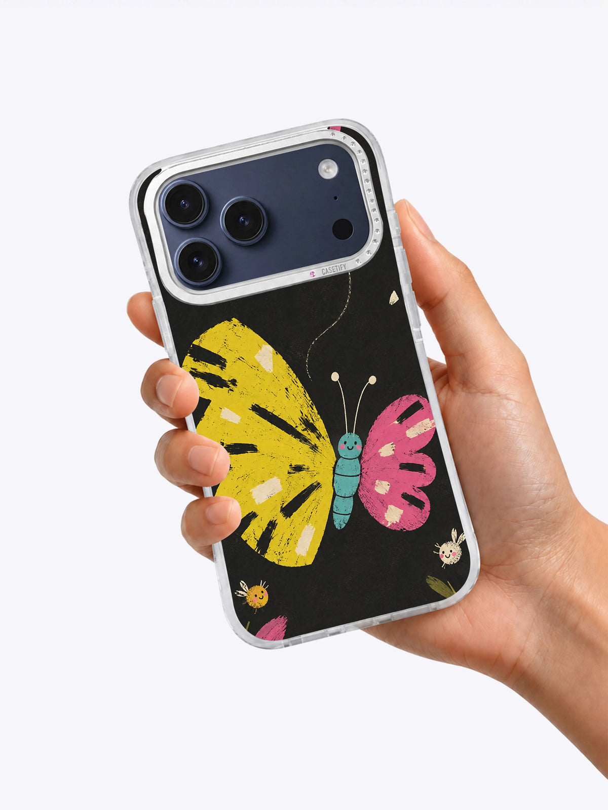 The Butterfly That Missed the Beat iPhone 17 Pro Max Case shown in hand