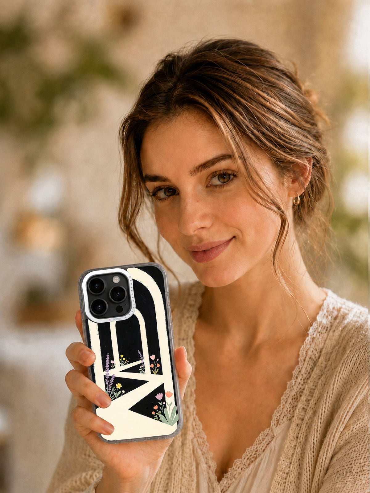 Woman holding Moon Garden Geometry art phone case