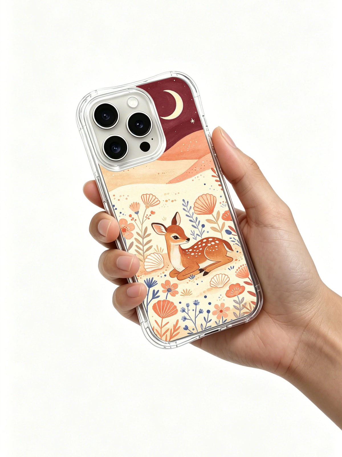 Moon Shell Fawn: A hand holding the illustrated case.