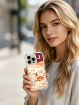 Moon Shell Fawn: A person holding the illustrated case outdoors.