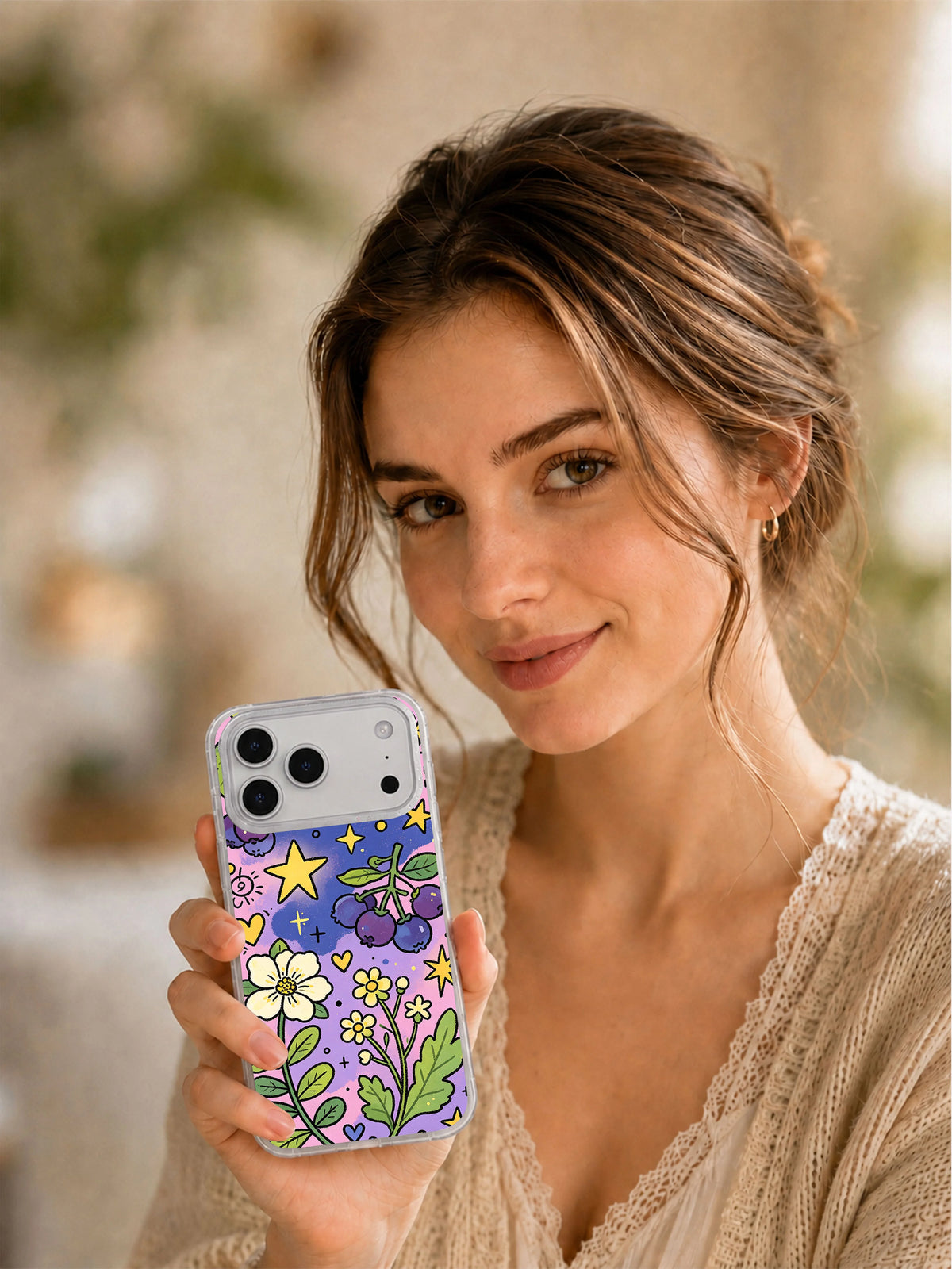 Moonlight Berry Garden iPhone 17 Pro Max case held in hand