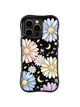 Crescent Daisy Garden: Scattered blue, pink and yellow daisies mix with crescent moons and tiny stars on black.