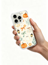Moonlit Tide Pumpkin Bay iPhone 14 Pro case held in hand