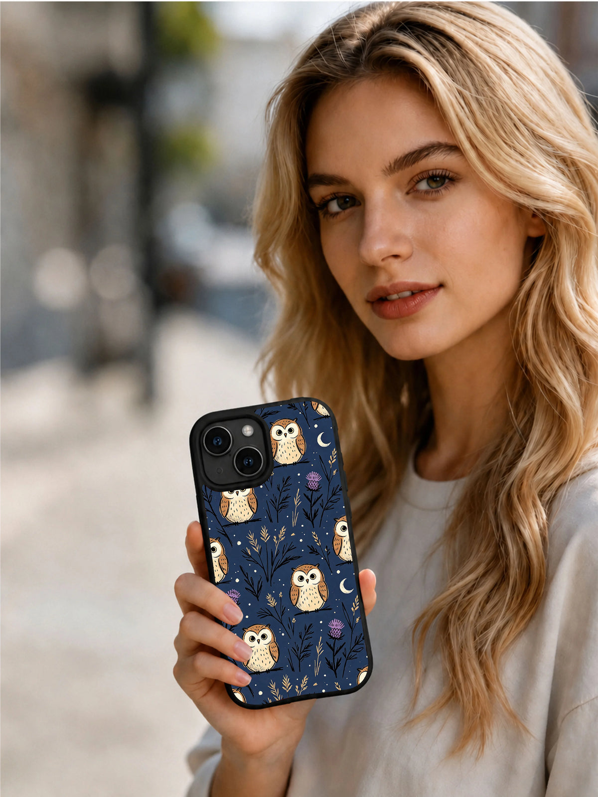 Product or handheld view of the Navy Owl Thistle Meadow case