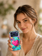 Lifestyle view of a person holding the Neon Heart Impact colorful comic iPhone case