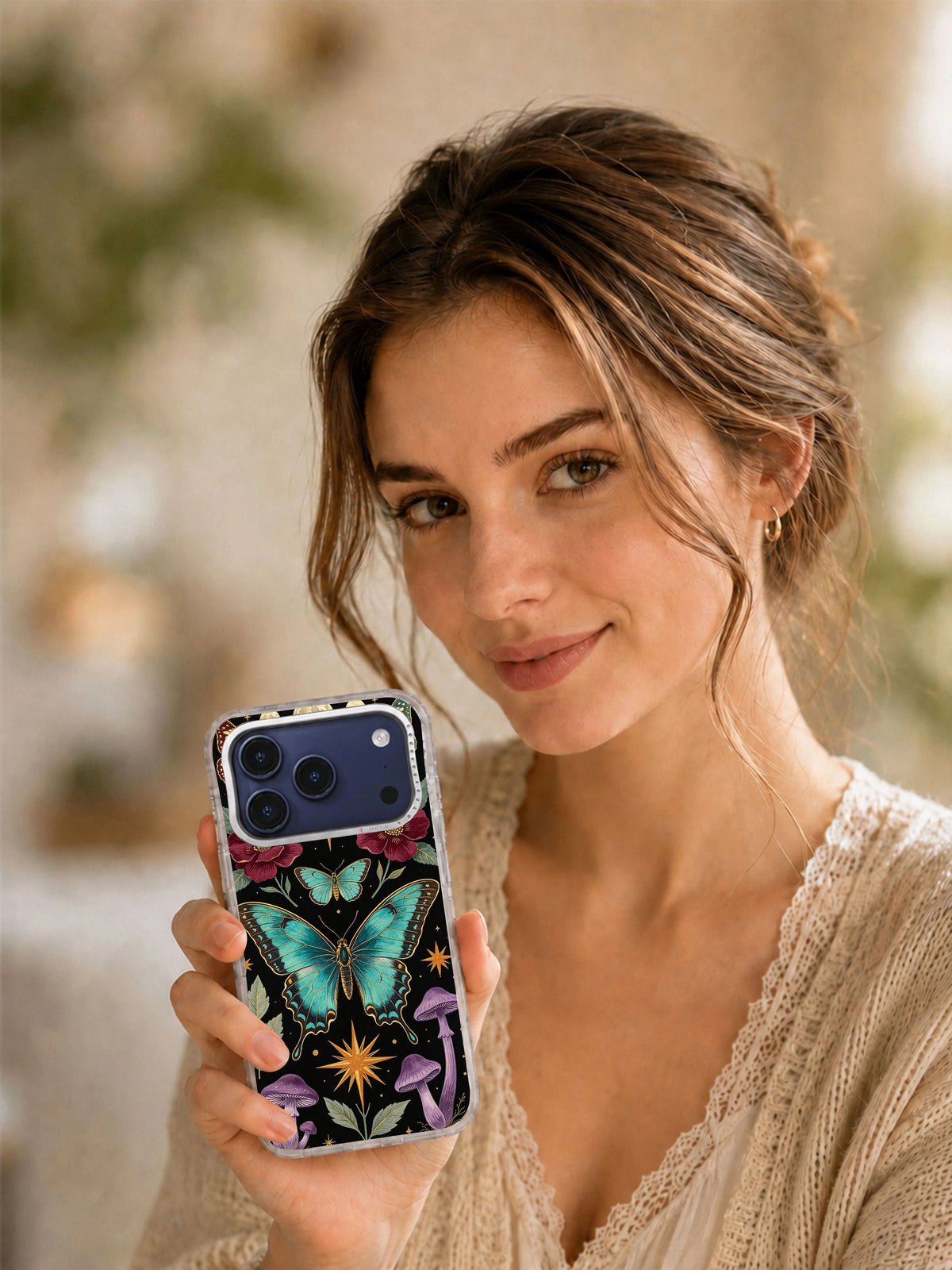 Lifestyle view of Night Butterfly Cabinet iPhone case with celestial butterfly artwork