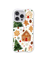 Evergreen Cookie Garden / Evergreen Cookie Cottage: İri kurabiye evleri, koyu yeşil ağaçlar ve küçük kahverengi figürler.