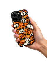 Pumpkin Parade Night iPhone case in hand