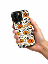 Spooky Pumpkin Friends iPhone case in hand