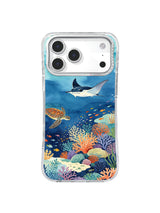 Manta ray and sea turtle crossing blue water above a vivid coral reef and small fish