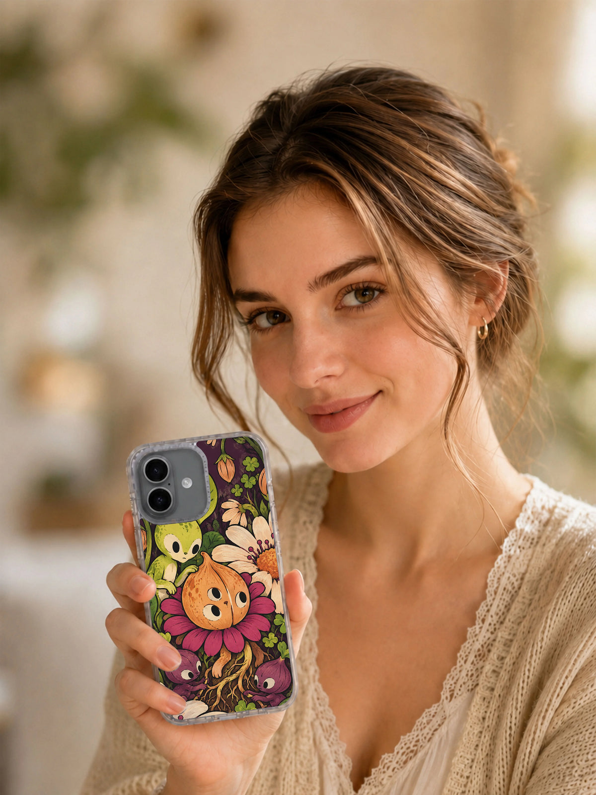 Lifestyle view of a person displaying The One-Centimeter Garden iPhone 17 case